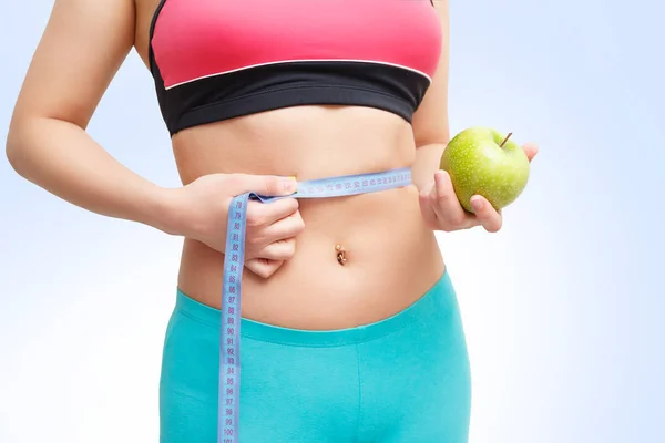 Fitness Meisje Met Centimeter Apple Hand — Stockfoto