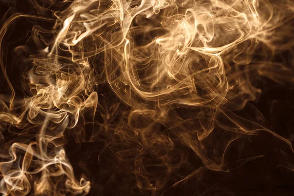 Koyu arkaplanda renkli duman