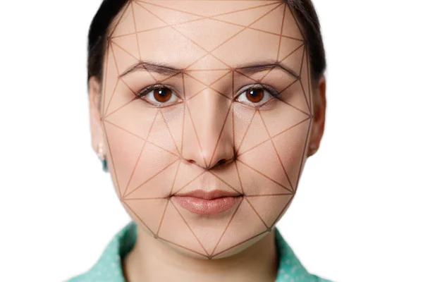Futuristic and technological scanning of the face of a beautiful woman for facial recognition and scanned person. It can serve to ensure personal safety. Concept of future, security, scanning.