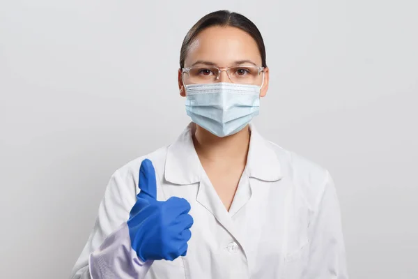 Young Woman Doctor Protective Mask Gloves Shows Thumb Gesture — Stock Photo, Image