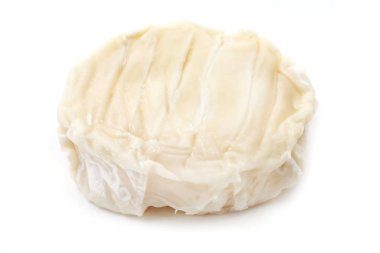 Picodon, yumuşak bir Fransız beyaz bir arka plan üzerinde keçi peyniri