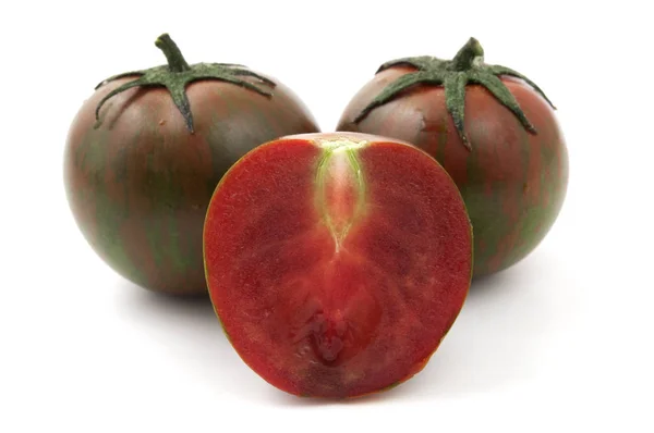 白色背景的巧克力条纹西红柿 — 图库照片