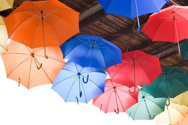 Many bright multicolored umbrellas under ceiling. fun, revelry. — Stock Image Many bright multicolored umbrellas under ceiling. fun, revelry. Royalty Free Stock Images