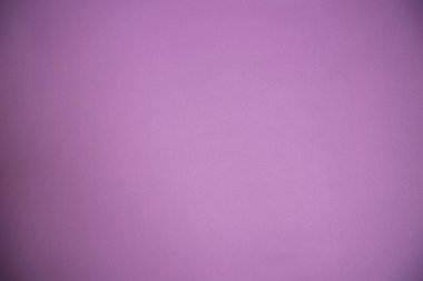 Kumaşın dokusu hassas pembe bir renktir. Arka plan, doku. Kartpostalın temeli. Pastel