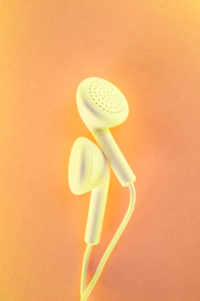 White Little Headphones Trendy Neon Yellow Light Top View Flat — ストック写真