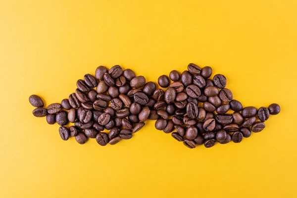 Movember Concept Coffee Beans Shape Mustache Yellow Background Contrasting Colors — Stock Photo, Image