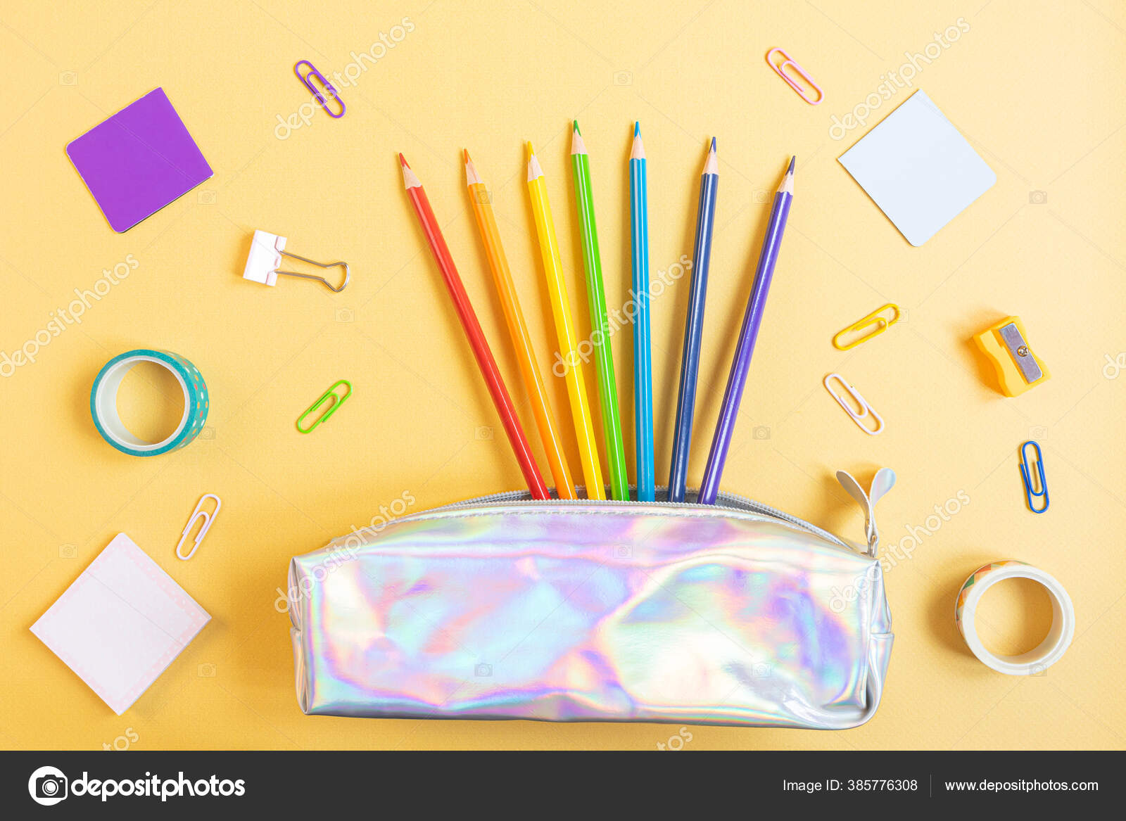 School Supplies And Coloring Pens Flat Lay On Yellow Background