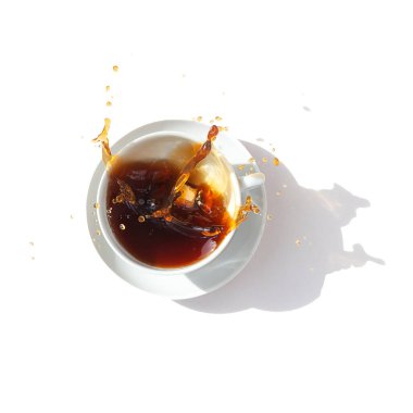 Black coffee in a white cup, top view. Sugar lumps are thrown into the cup, spectacular splashes are spilling out of the cup. White background. International coffee day. clipart