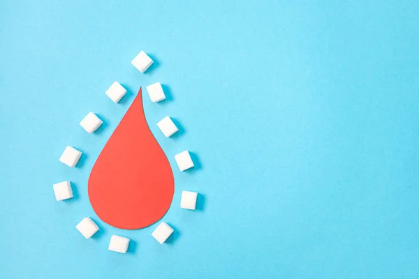 Dia Mundial Diabetes Uma Grande Gota Papel Sangue Fundo Azul — Fotografia de Stock