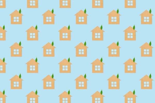 Huizen Gemaakt Van Ambachtelijk Papier Groene Bladeren Van Een Plant — Stockfoto