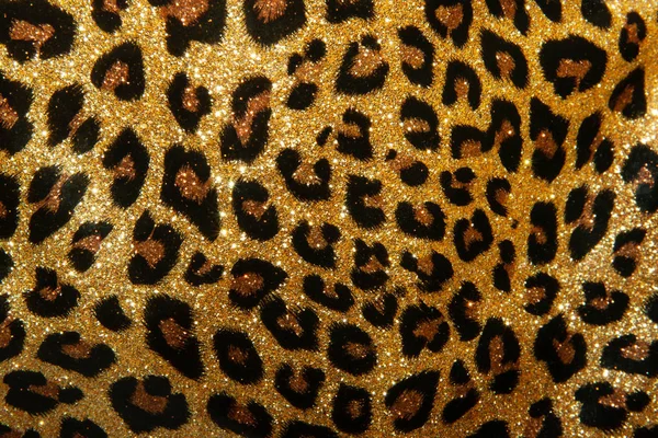 Leopard texture of small sequins. bright beautiful background. glamour — Stock Photo, Image