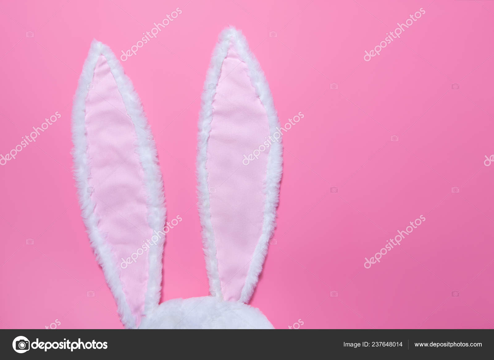 Hare Ears Made Of White Fur On Pink Pastel Background The Concept