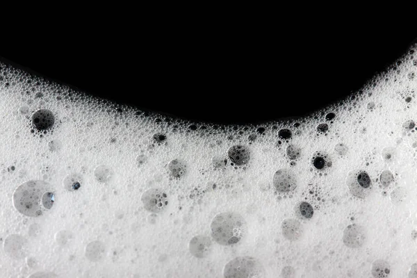 Bolhas de espuma abstrato fundo preto . — Fotografia de Stock