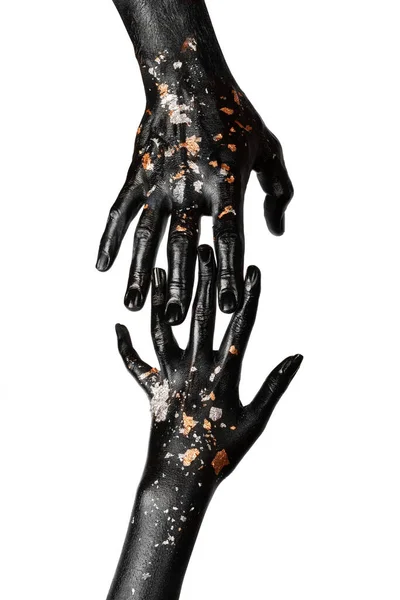 Black and gold hands touch. Concept. Contact. — Stock Photo, Image