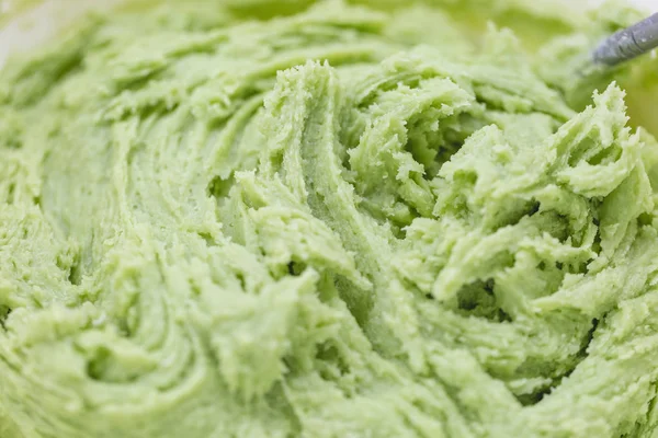 Close up on green cookie dough. Spring holidays cooking concept. — Stock Photo, Image