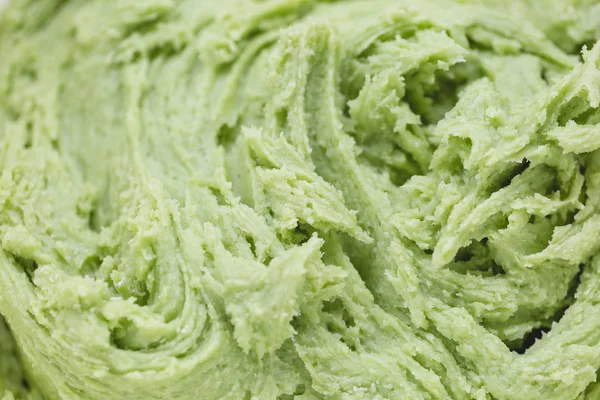 Close up on green cookie dough. Spring holidays cooking concept. — Stock Photo, Image