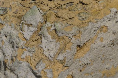 Duvar dokusu büyük bir çimento harç tabakası ile.