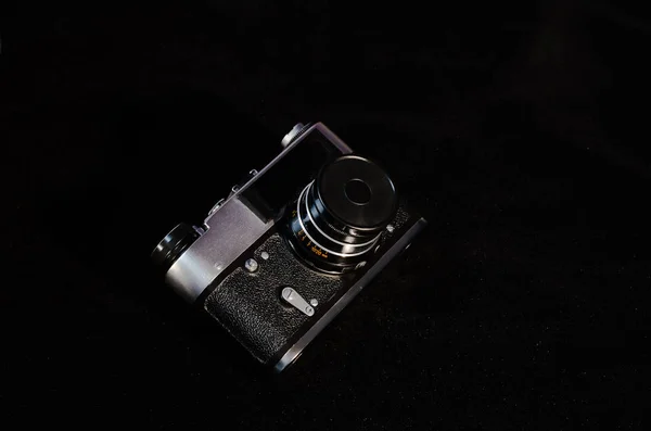 Old camera FED on a black background. — Stock Photo, Image