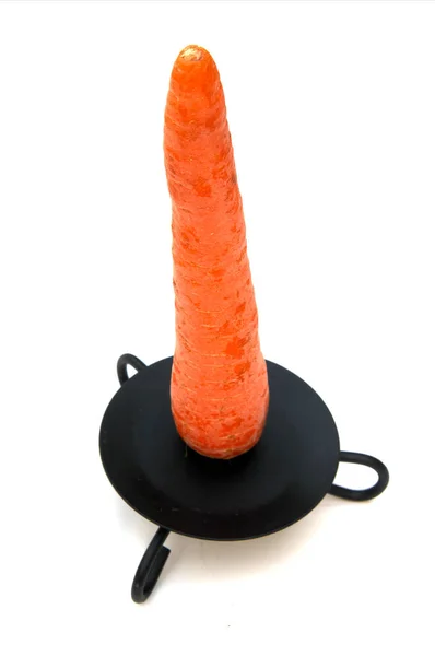 Candlestick with carrot — Stock Photo, Image