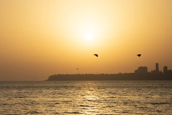 Scenic sunset view of Marine Drive in Mumbai, India.