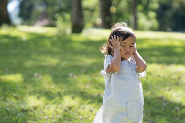 Toddler frustrated cover her ears — Stock Photo, Image