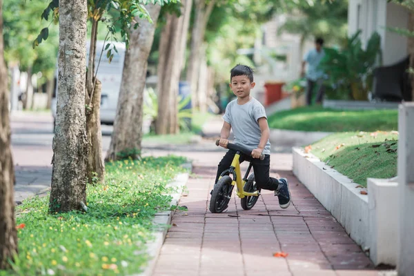 Ride a bike using push or balance bicycle — Stock Photo, Image