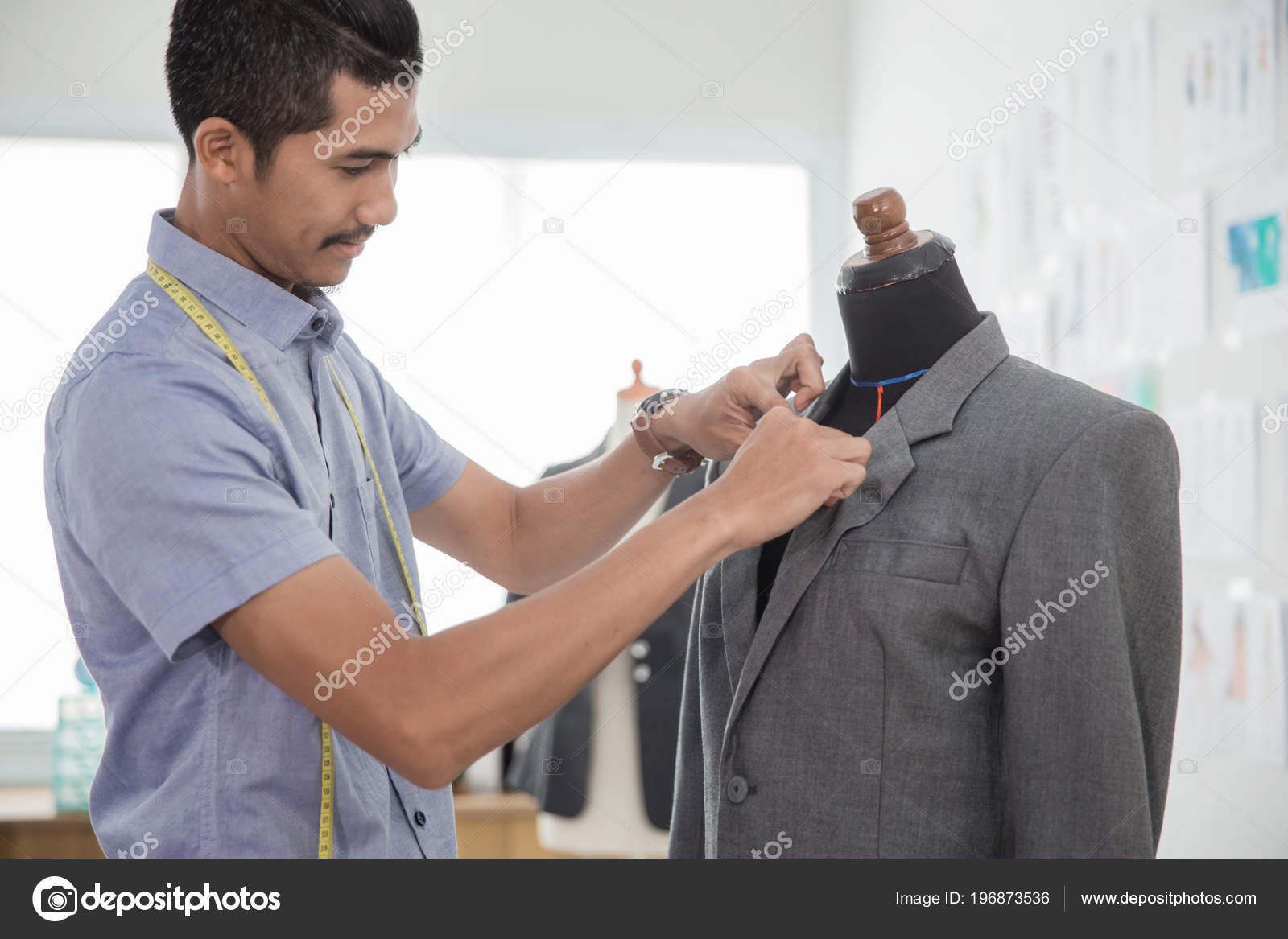 Fashion designer make a clothing Stock Photo by ©odua 196873536