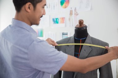 Moda Tasarımcısı yapmak bir takım elbise