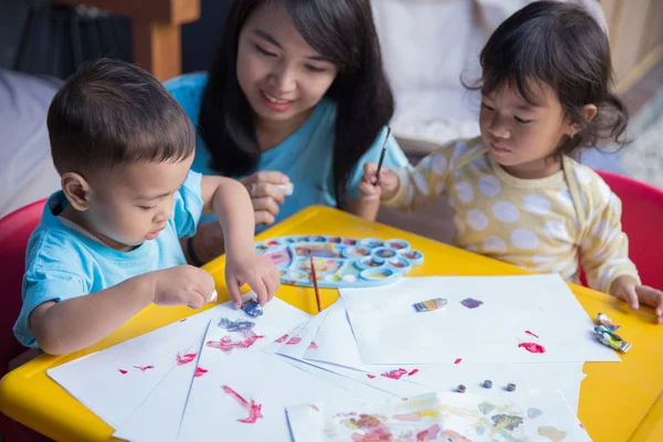 Child painting with water color — Stock Photo, Image