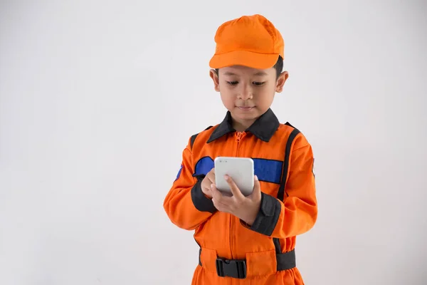 Asian little boy with technician, engineer or astronaut uniform — Stock Photo, Image