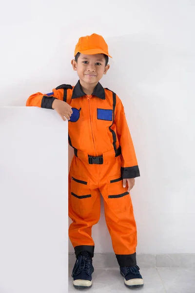 Asian little boy with technician, engineer or astronaut uniform — Stock Photo, Image