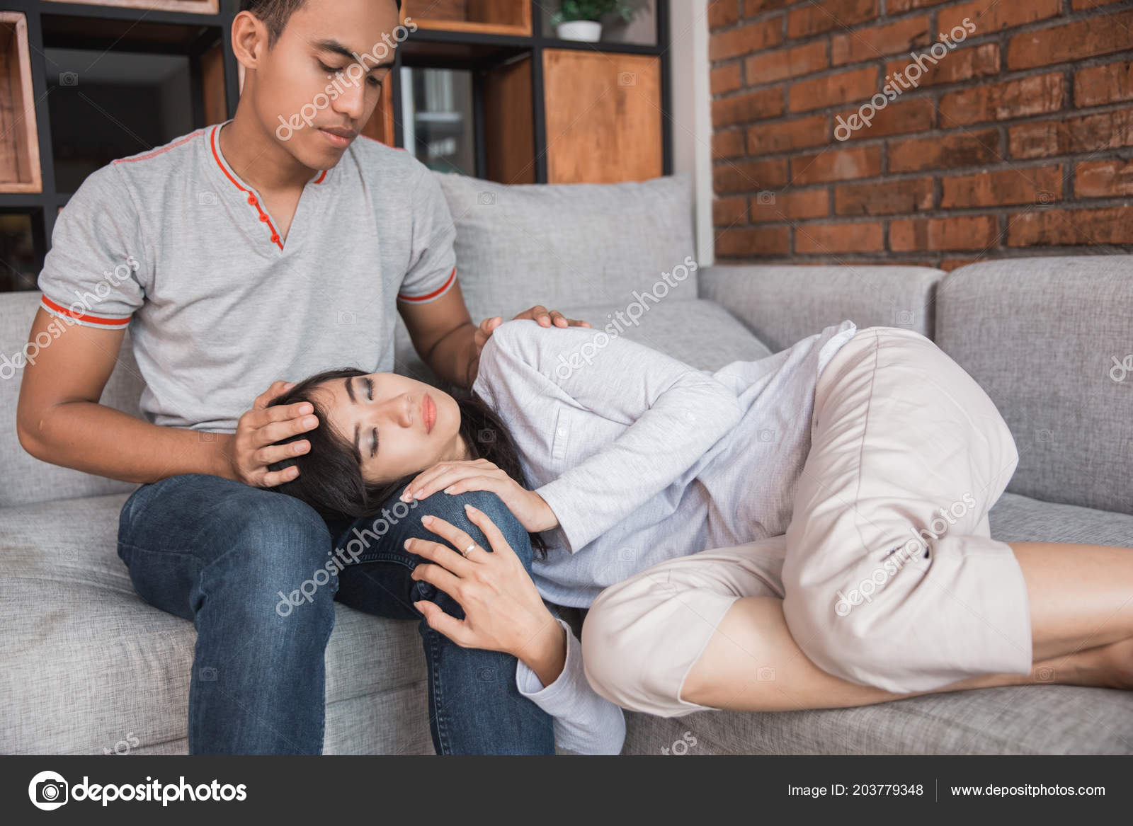 Young Man Comforting Crying Sad Woman Caring Husband Showing