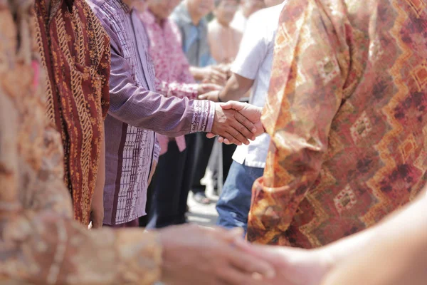 Shake hand in muslim celebration — Stock Photo, Image