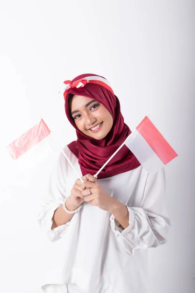Mujer musulmana con bandera indonesia — Foto de Stock