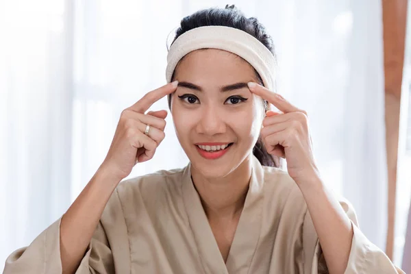 Young woman self face  massage — Stock Photo, Image