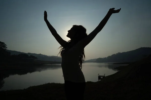 Portrait silhouette of woman wake up in the morning — Stock Photo, Image