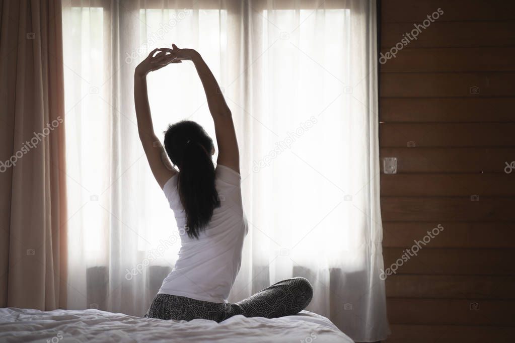portrait woman morning wake up doing stretching