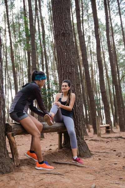 woman help her friend after getting injury