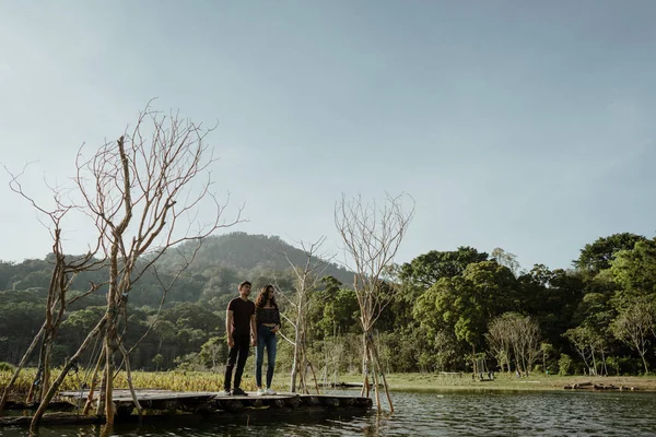 Beautiful lake with friend together — Stock Photo, Image