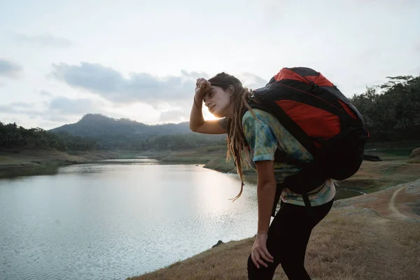 Portrait caucasian woman tired on a side lake — Stock Photo, Image