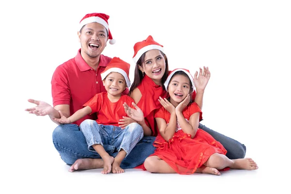 Excited asian family with christmas head — Stock Photo, Image