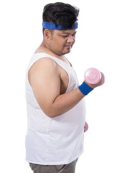 ダンベルで脂肪の若い男性の肖像画 — ストック写真