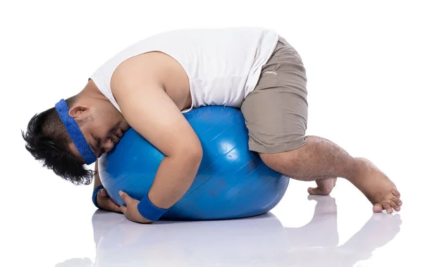 Portrait of fat young men do pilates exercise — Stock Photo, Image