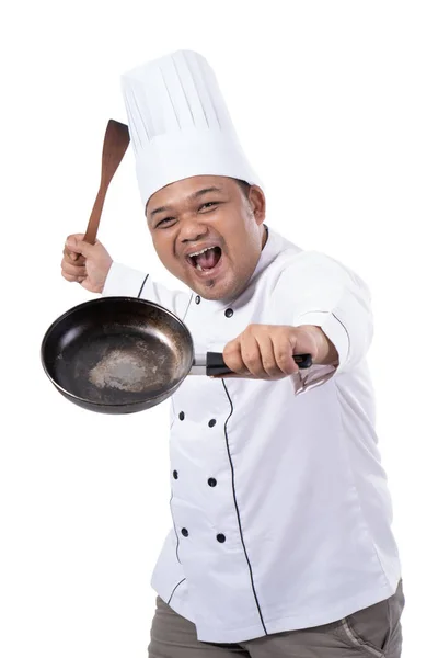 Imagens de confiança do chef com as mãos pose segurando pan — Fotografia de Stock