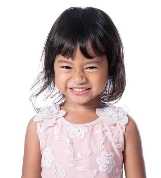 Criança mostrando expressão sorridente mal — Fotografia de Stock