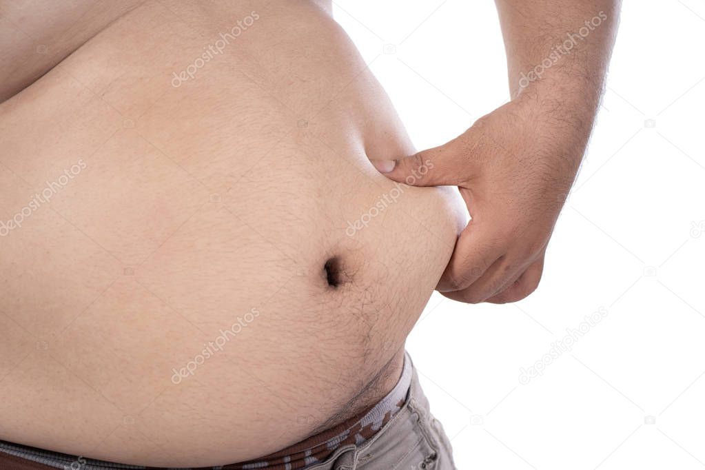 close up of fat man pinch excess fat that has around his waist
