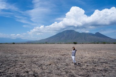 woman in dry landscape savanna clipart