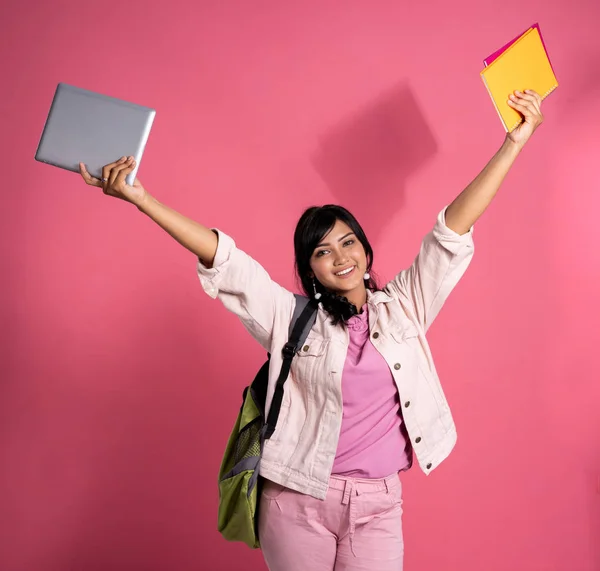 Happy asian college student raise her arm — Stock Photo, Image