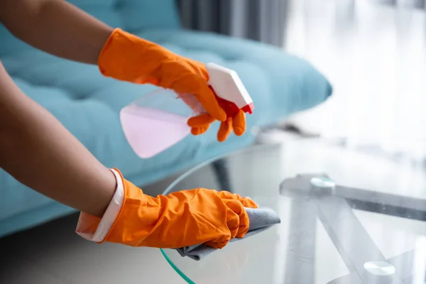 Cleaning and spraying on glass table — Stock Photo, Image