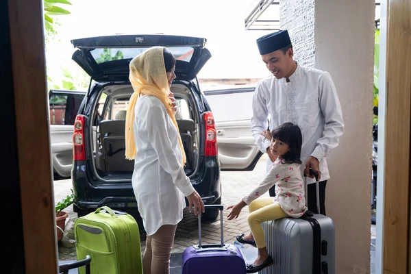 asian muslim family travelling concept